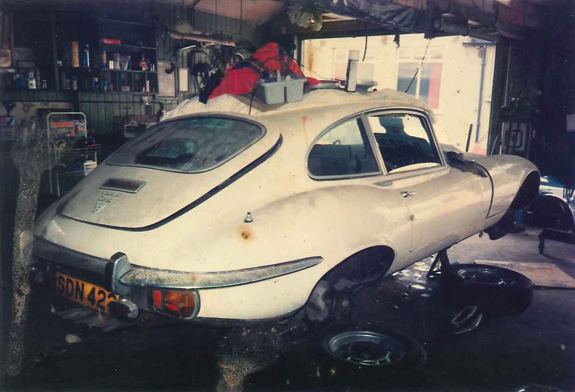 old jaguar in garage